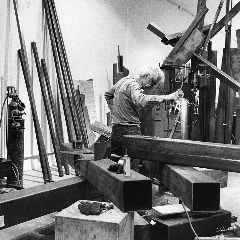 Tony Rosenthal Working on square steel beams in the workshop
